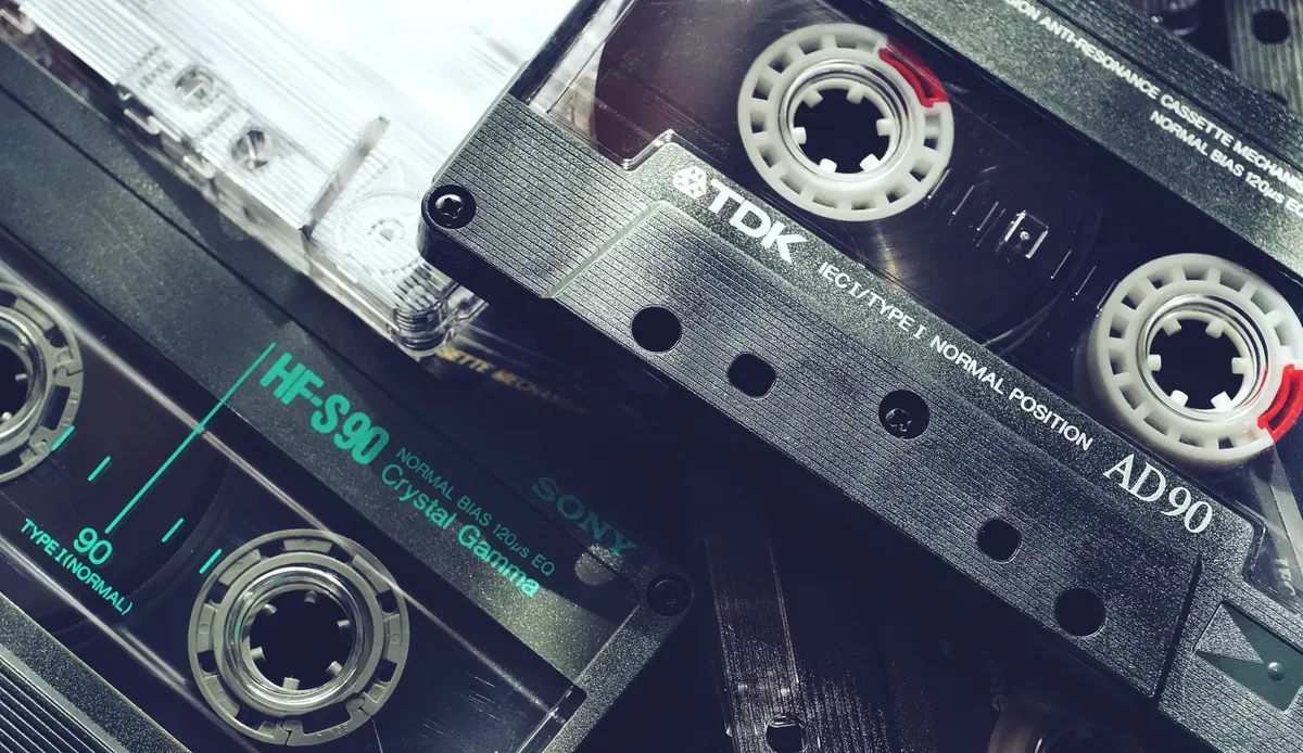 A nostalgic close-up of vintage cassette tapes showcasing 1980s audio technology and retro vibes.