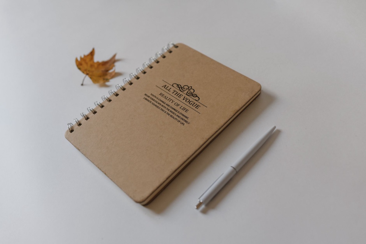 notebook with pen