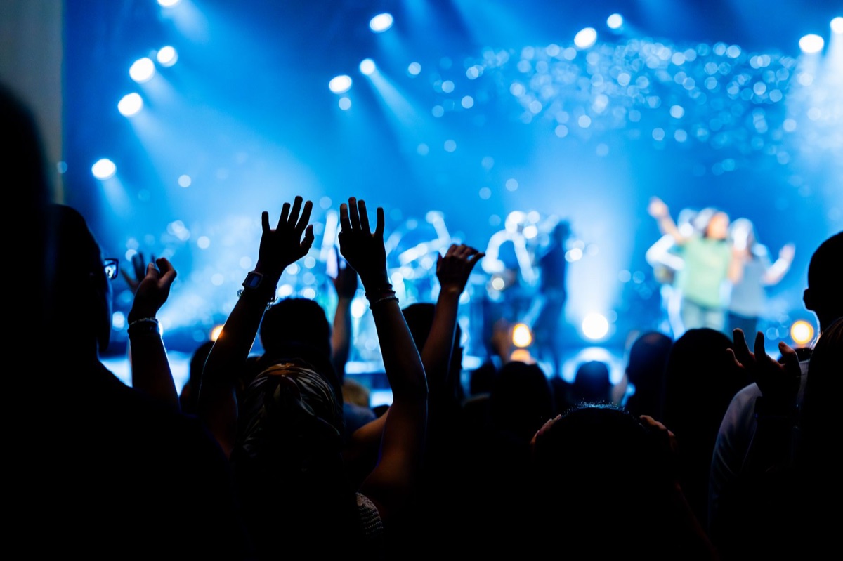 concert audience cheering for K-pop debut song